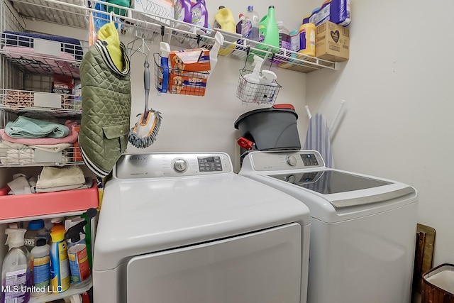 washroom featuring washer and dryer