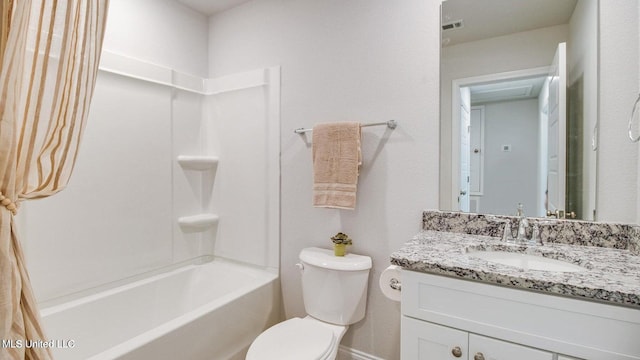 full bathroom with vanity, toilet, and shower / bath combo