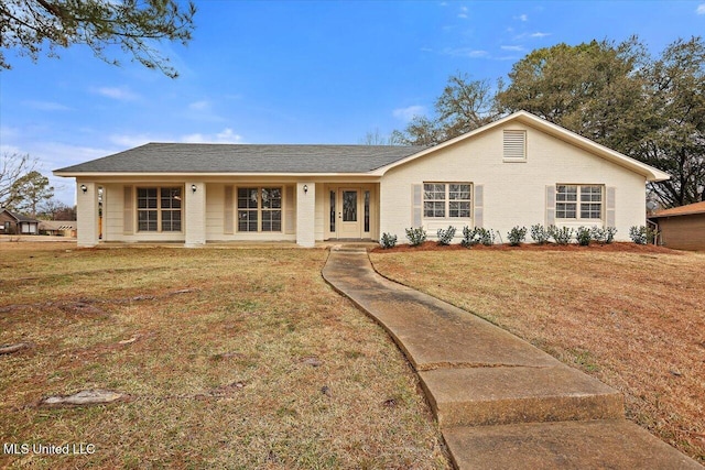 ranch-style house with a front yard