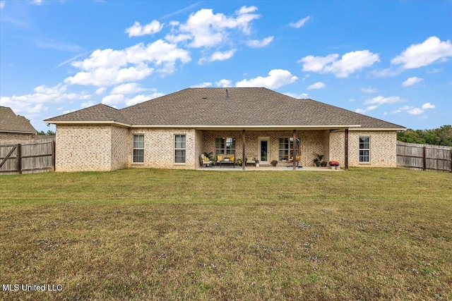 142 Western Ridge Cir, Canton, MS 39046 - rear view of property featuring a patio area and brick siding