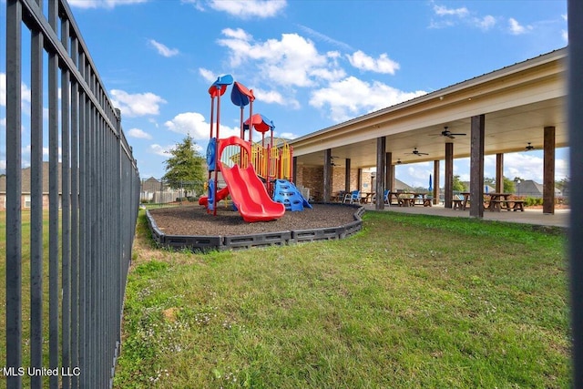 142 Western Ridge Cir, Canton, MS 39046 - community play area with a yard and a ceiling fan