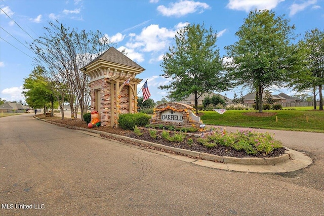142 Western Ridge Cir, Canton, MS 39046 - community / neighborhood sign featuring a yard