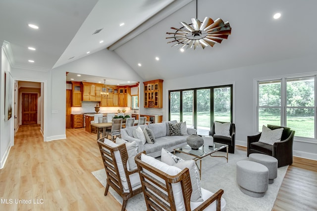 106 Horseshoe Ln, Flora, MS 39071 - living room featuring recessed lighting, light wood-style flooring, baseboards, a chandelier, and high vaulted ceiling
