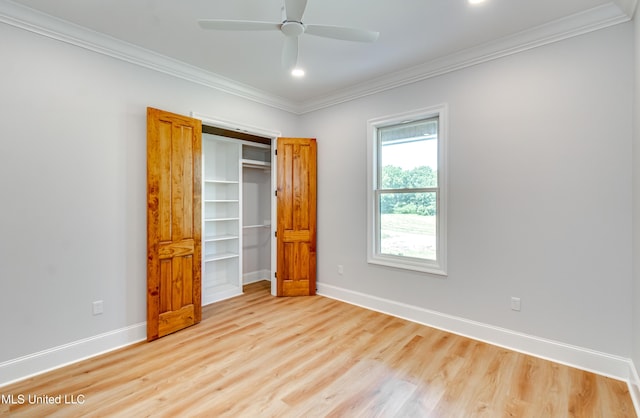 106 Horseshoe Ln, Flora, MS 39071 - unfurnished bedroom featuring crown molding, light wood-style floors, baseboards, a closet, and recessed lighting