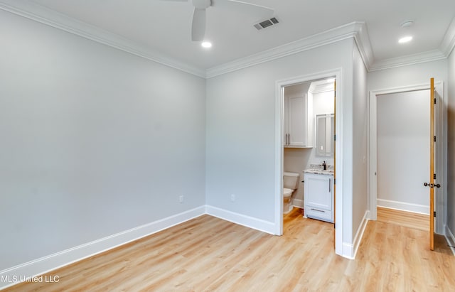 106 Horseshoe Ln, Flora, MS 39071 - unfurnished bedroom featuring light wood-style floors, baseboards, ornamental molding, recessed lighting, and ensuite bathroom