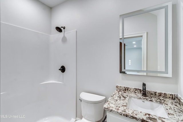 106 Horseshoe Ln, Flora, MS 39071 - bathroom featuring vanity, a shower, and toilet
