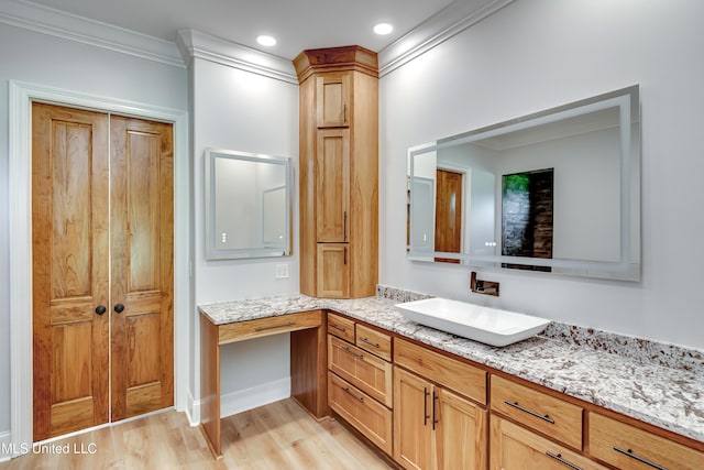 106 Horseshoe Ln, Flora, MS 39071 - bathroom featuring wood finished floors, crown molding, and vanity