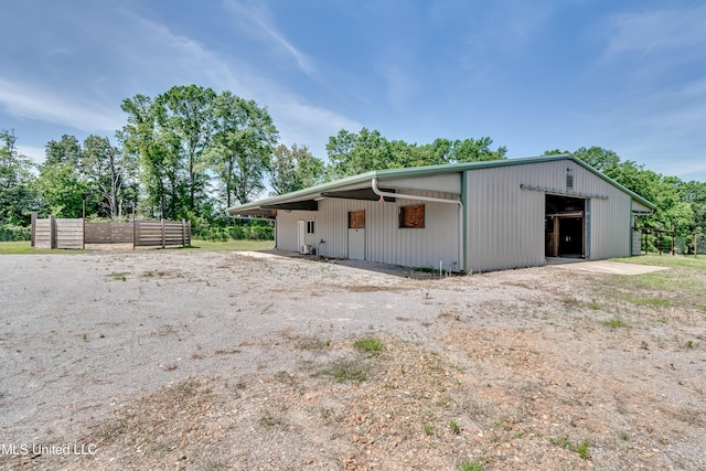 106 Horseshoe Ln, Flora, MS 39071 - exterior space with an outbuilding and a detached garage