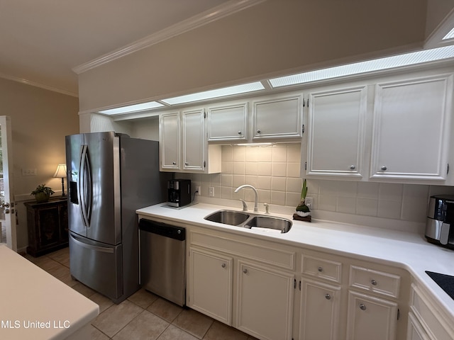 1331 Northwood Cir, Carthage, MS 39051 - kitchen featuring stainless steel appliances, ornamental molding, decorative backsplash, light countertops, and light tile patterned flooring