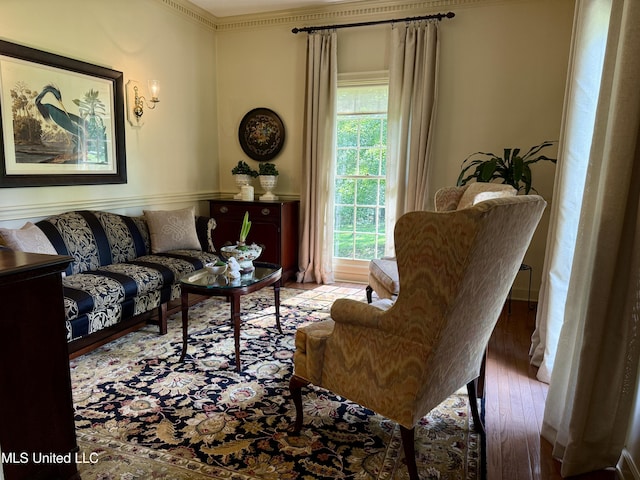 1331 Northwood Cir, Carthage, MS 39051 - living room featuring wood finished floors and ornamental molding