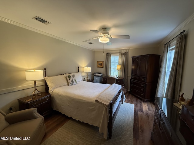 1331 Northwood Cir, Carthage, MS 39051 - bedroom with dark wood-style flooring, ornamental molding, and ceiling fan