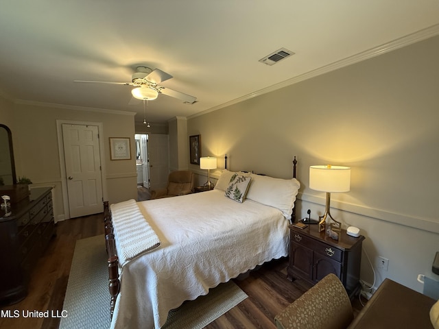 1331 Northwood Cir, Carthage, MS 39051 - bedroom with dark wood-style flooring, crown molding, and ceiling fan