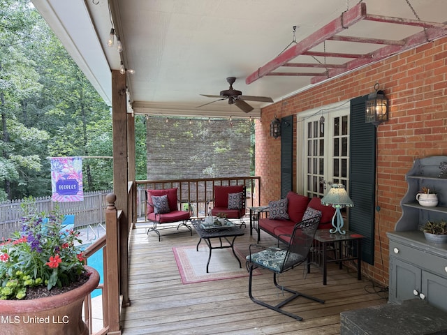 1331 Northwood Cir, Carthage, MS 39051 - deck featuring french doors, a ceiling fan, and an outdoor living space