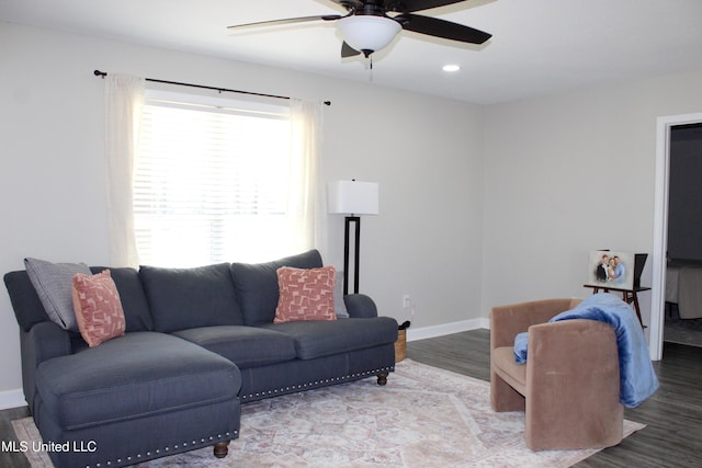 living room with a ceiling fan, baseboards, wood finished floors, and recessed lighting