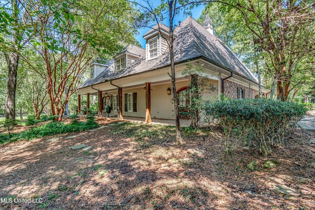 338 Hillview Dr, Ridgeland, MS 39157 - view of property exterior featuring ceiling fan and a patio