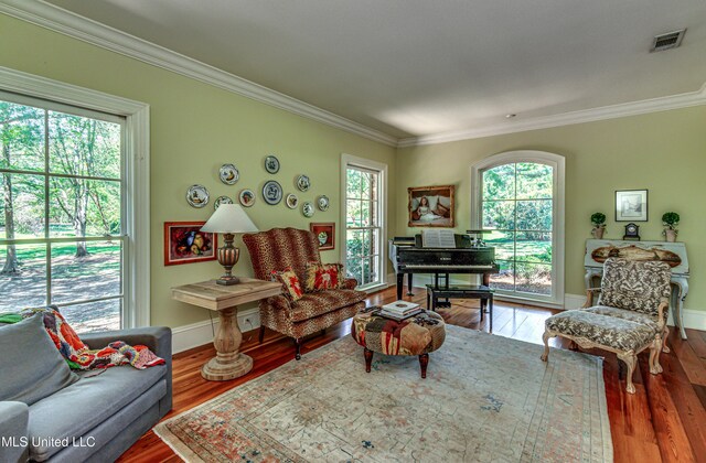 338 Hillview Dr, Ridgeland, MS 39157 - living room with plenty of natural light, wood-type flooring, and ornamental molding