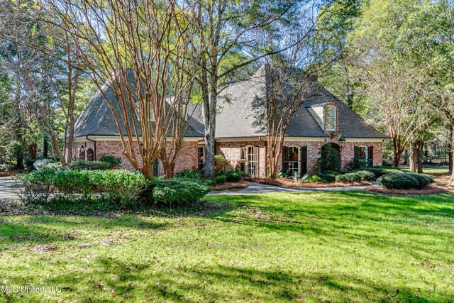 338 Hillview Dr, Ridgeland, MS 39157 - view of front of home with a front yard