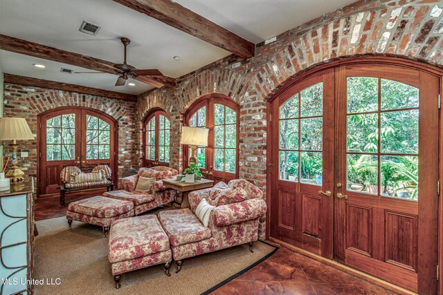 338 Hillview Dr, Ridgeland, MS 39157 - interior space featuring brick wall, tile patterned floors, french doors, ceiling fan, and beam ceiling
