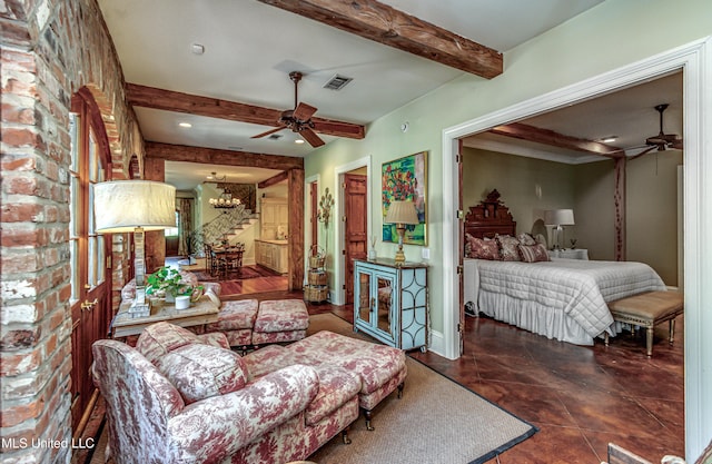 338 Hillview Dr, Ridgeland, MS 39157 - living room featuring ceiling fan with notable chandelier, dark tile patterned flooring, brick wall, and beam ceiling
