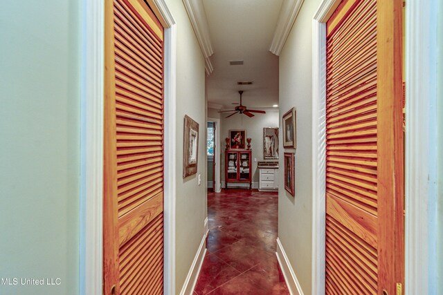 338 Hillview Dr, Ridgeland, MS 39157 - corridor with dark tile patterned floors and crown molding