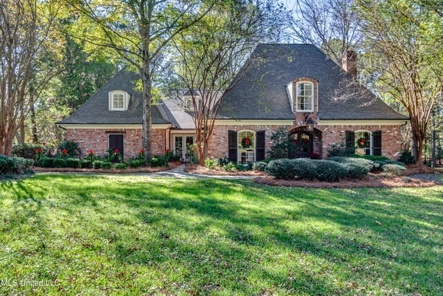 338 Hillview Dr, Ridgeland, MS 39157 - view of front of house featuring french doors and a front yard