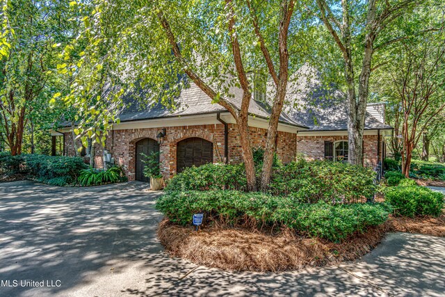 338 Hillview Dr, Ridgeland, MS 39157 - view of front of house with a garage