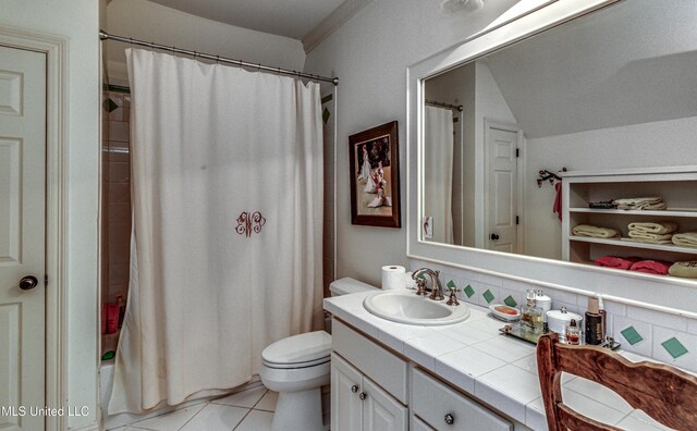 338 Hillview Dr, Ridgeland, MS 39157 - bathroom with tasteful backsplash, vanity, toilet, tile patterned floors, and a shower with curtain