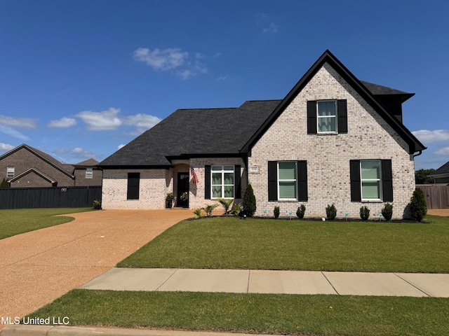 view of front of home with a front yard