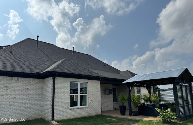 rear view of property with a patio