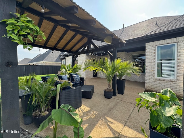 view of patio / terrace with ceiling fan, a gazebo, and outdoor lounge area