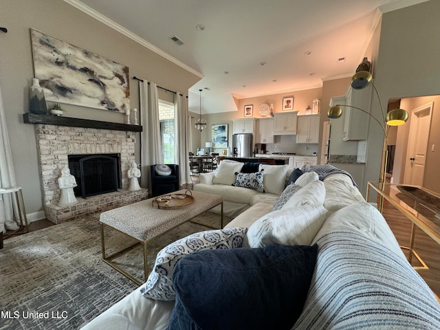 living room featuring ornamental molding and hardwood / wood-style floors