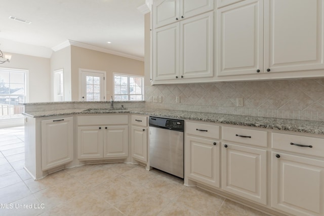 kitchen featuring white cabinetry, sink, light stone counters, and stainless steel dishwasher