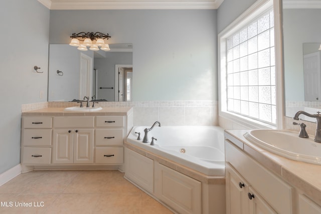 bathroom with vanity, tile patterned floors, ornamental molding, and a tub