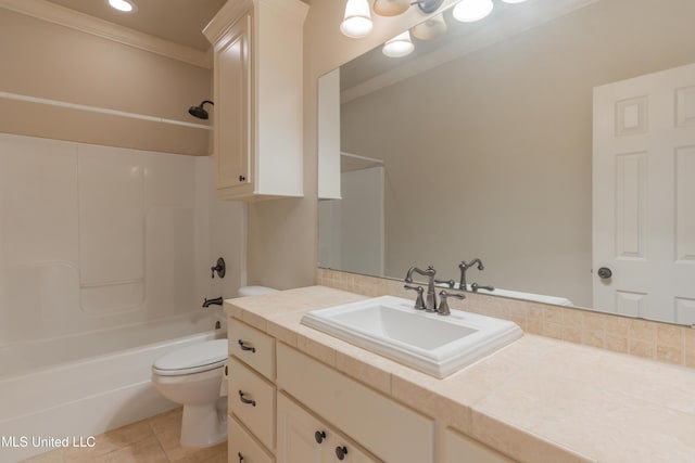 full bathroom with tile patterned floors, toilet, crown molding,  shower combination, and vanity