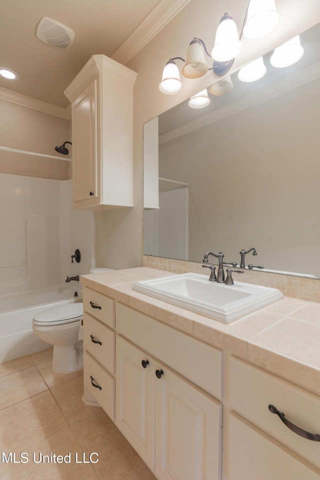 full bathroom featuring shower / bathtub combination, tile patterned flooring, vanity, toilet, and crown molding