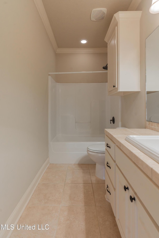 bathroom with a shower, tile patterned flooring, vanity, toilet, and crown molding