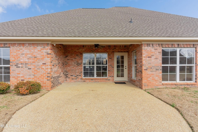 rear view of house with a patio