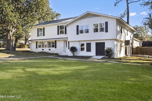 view of front of home with a front yard