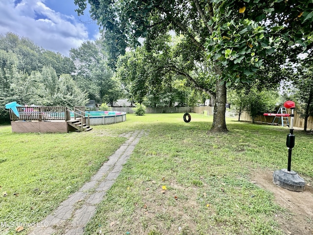 7264 Flower Creek Dr, Southaven, MS 38671 - fenced backyard with a wooden deck