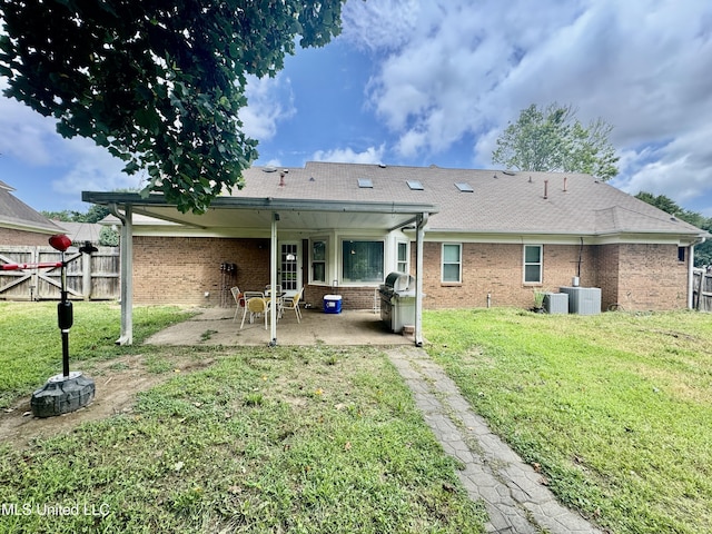 7264 Flower Creek Dr, Southaven, MS 38671 - back of house featuring a patio and brick siding