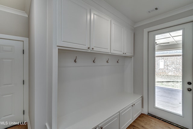 mudroom featuring crown molding and light hardwood / wood-style flooring