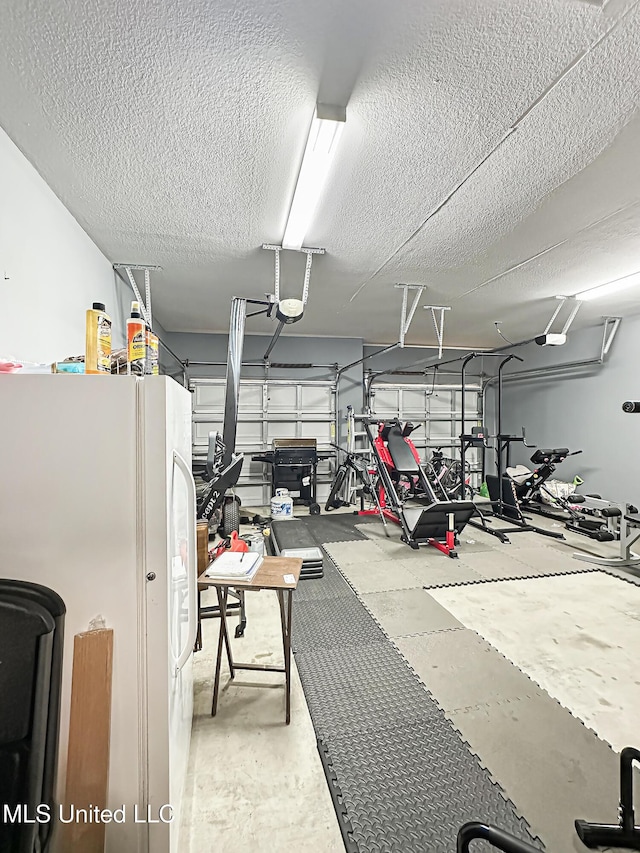 garage with freestanding refrigerator