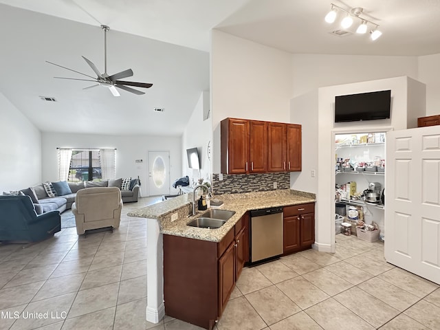 kitchen featuring ceiling fan, a sink, dishwasher, high vaulted ceiling, and light tile patterned floors