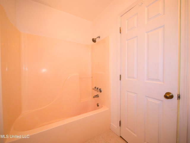 full bathroom with tile patterned flooring and shower / bath combination