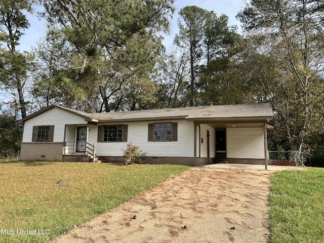 ranch-style house with a front lawn and a carport