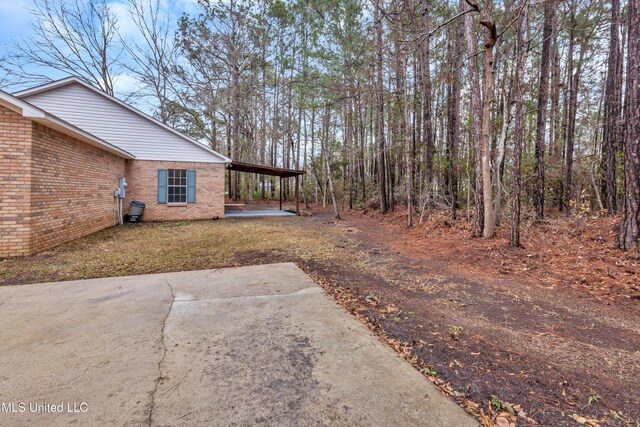 view of yard featuring a carport