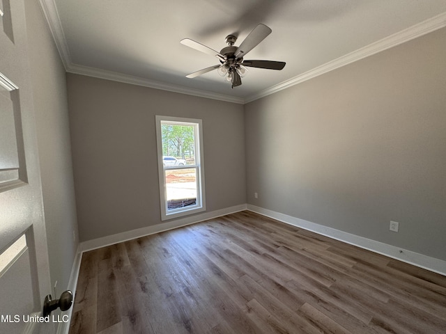 213 Walter Jones Rd, Mendenhall, MS 39114 - empty room with ceiling fan, baseboards, ornamental molding, and wood finished floors