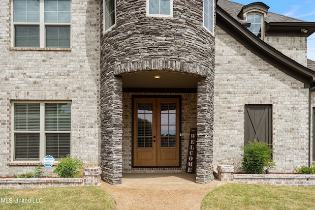 entrance to property featuring french doors