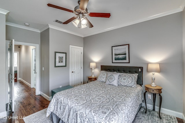 bedroom with ceiling fan, dark hardwood / wood-style floors, and ornamental molding