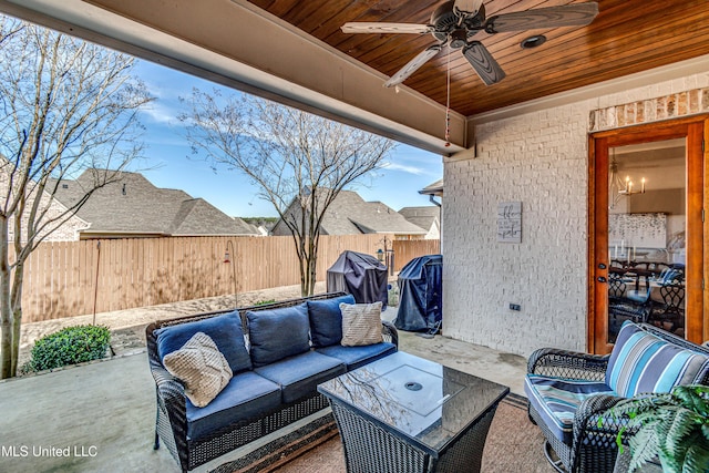 view of patio featuring ceiling fan, grilling area, and an outdoor hangout area